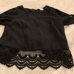 Hollister black top with ruffles.